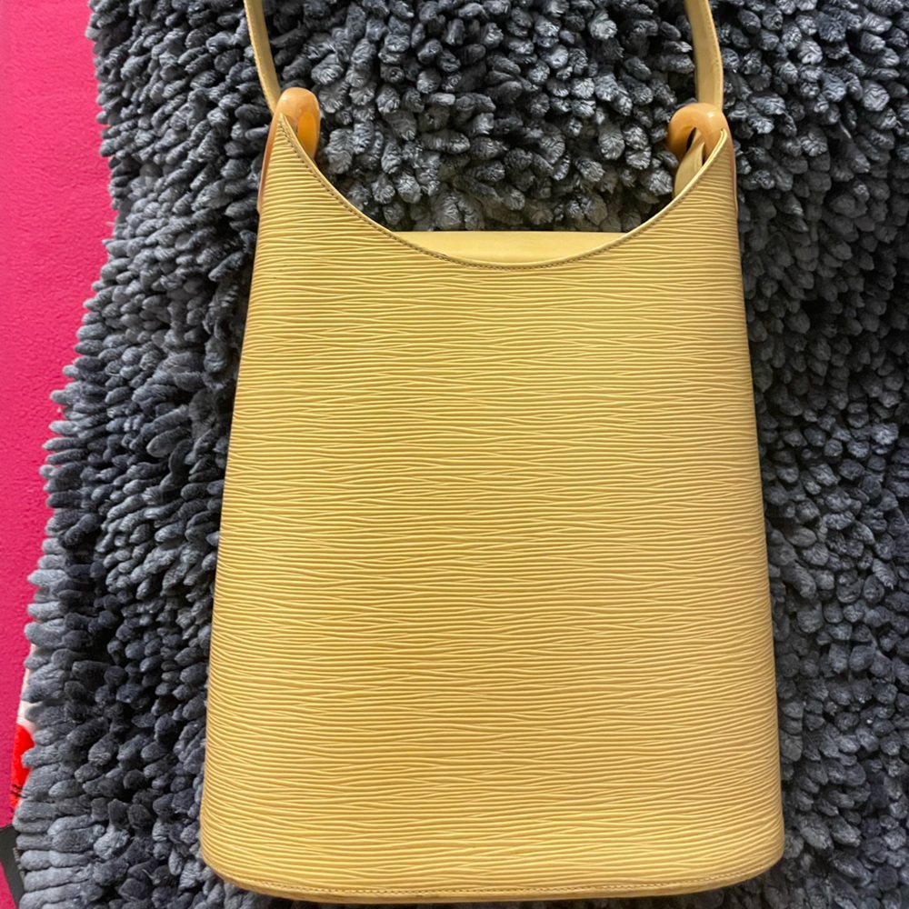 Louis Vuitton Epi bucket bag. Never used. NWOT